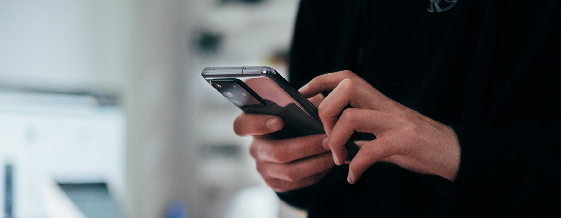 close up of resident on her cell phone